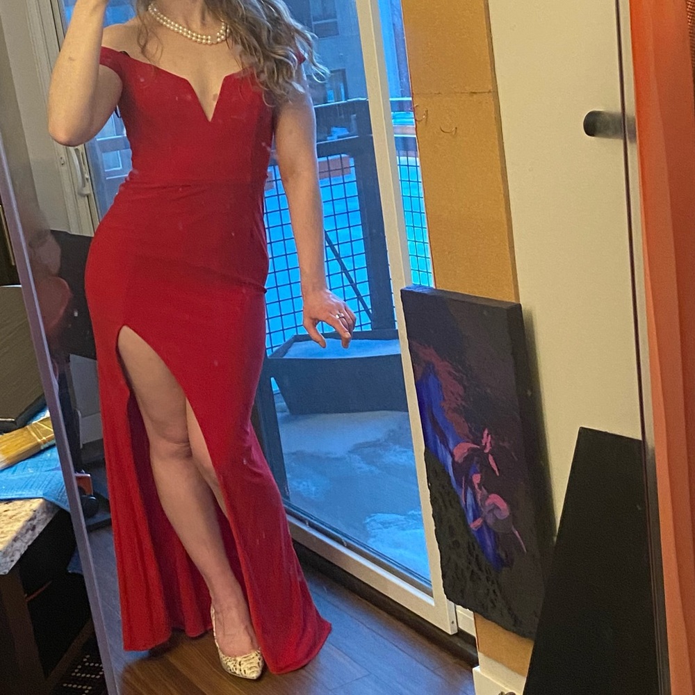 Red off the shoulder floor length gown with slit